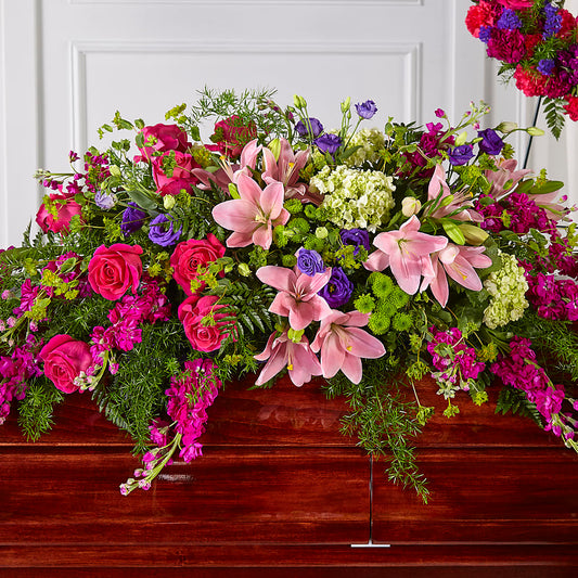 Radiant Tribute Casket Spray – GARRISON DESIGNS FLORIST & INTERIORS, Huntington WV